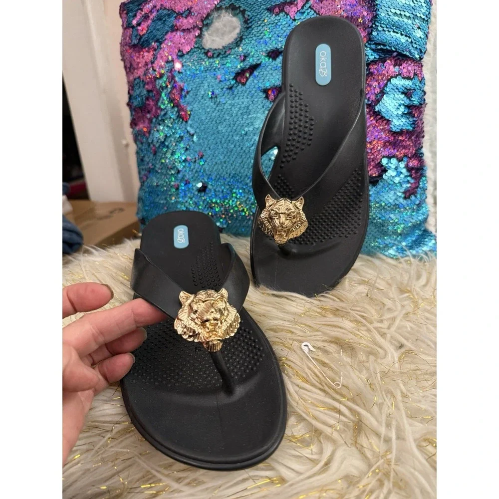 New Okab Black Licorice Gold Lion Head Rubber Flip Flop Thong Sandals Womens M/L
